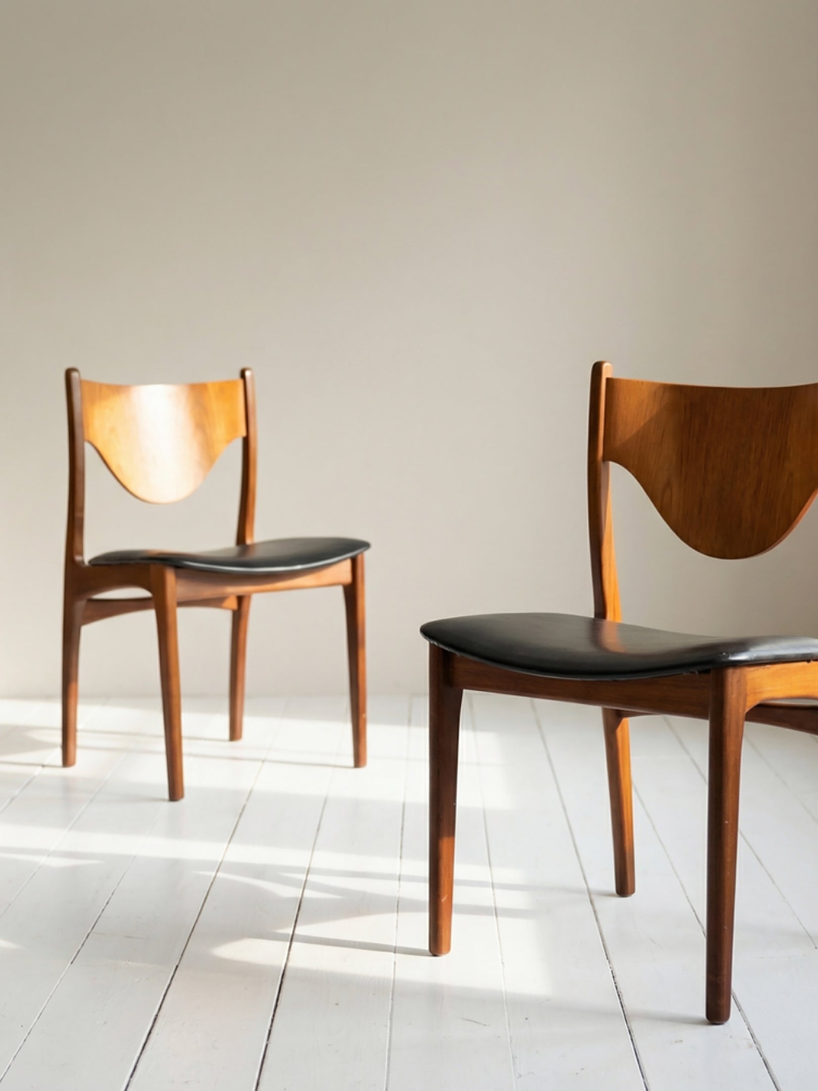 Pair of Mid Century Teak Dining Chairs with Black Vinyl Seats (c. 1960s–70s)