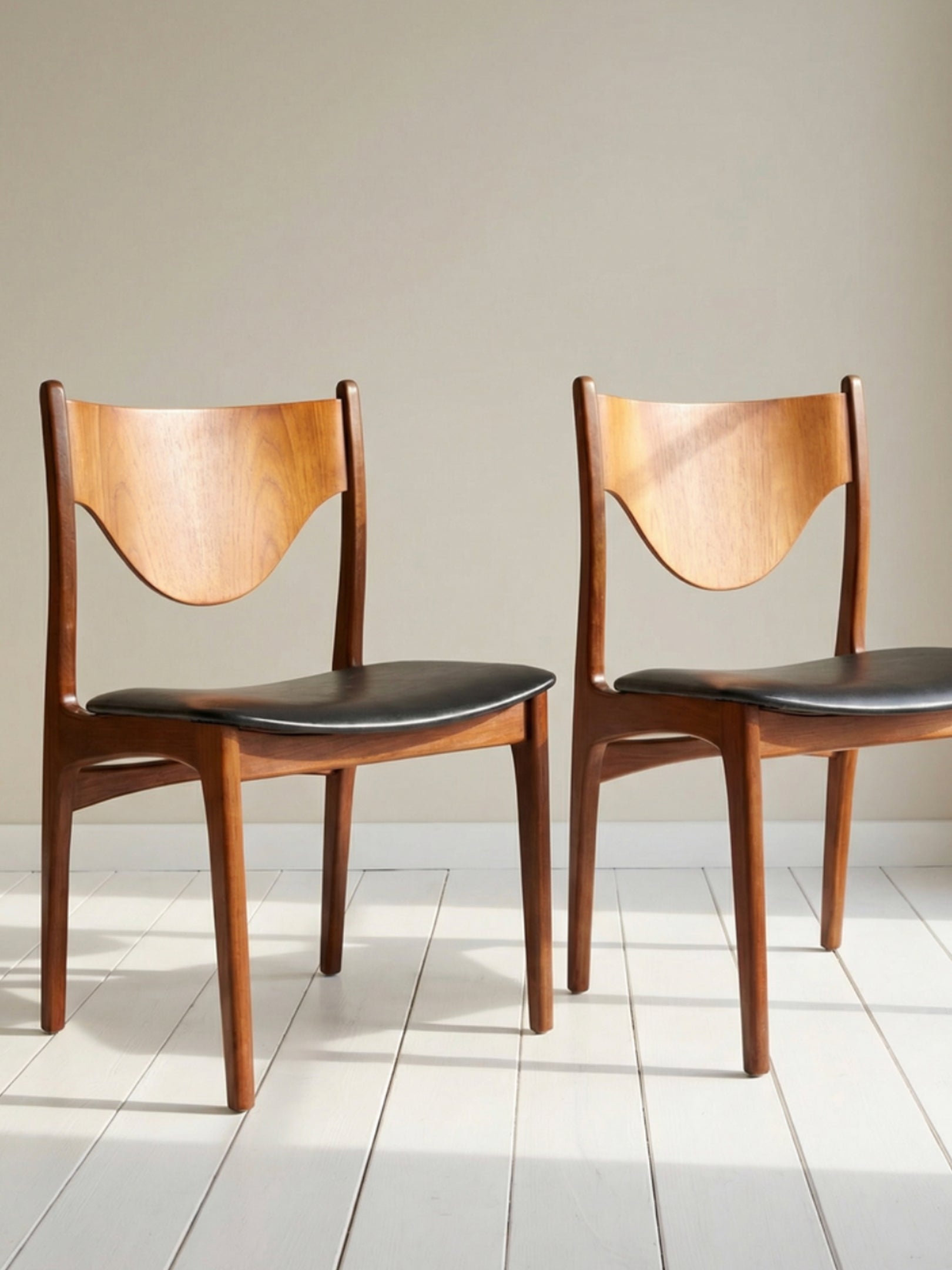 Pair of Mid Century Teak Dining Chairs with Black Vinyl Seats (c. 1960s–70s)