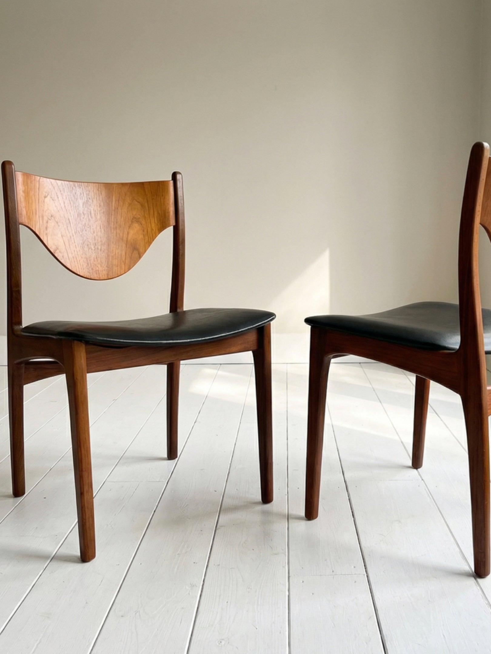 Pair of Mid Century Teak Dining Chairs with Black Vinyl Seats (c. 1960s–70s)