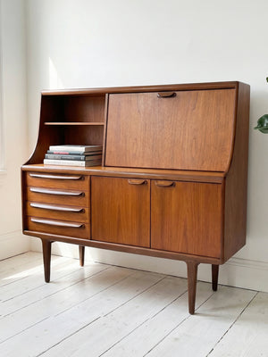 A YOUNGER TEAK HIGH-BOARD BY JOHN HERBERT 1960S