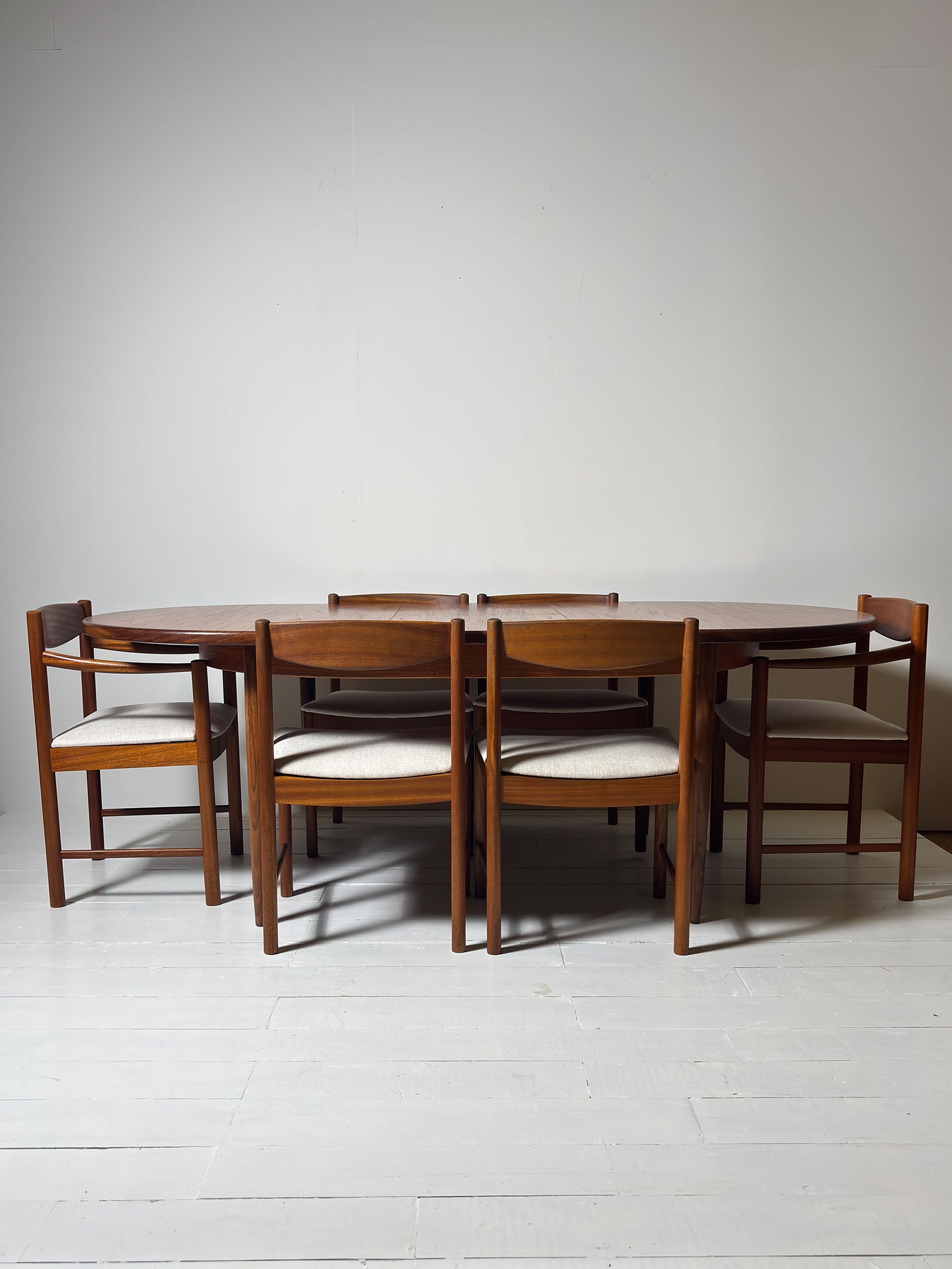 McIntosh dining chair with carved back detail 1960s" or "McIntosh carver chair with arms Tom Robertson design. Teak, Reupholstered, restored.