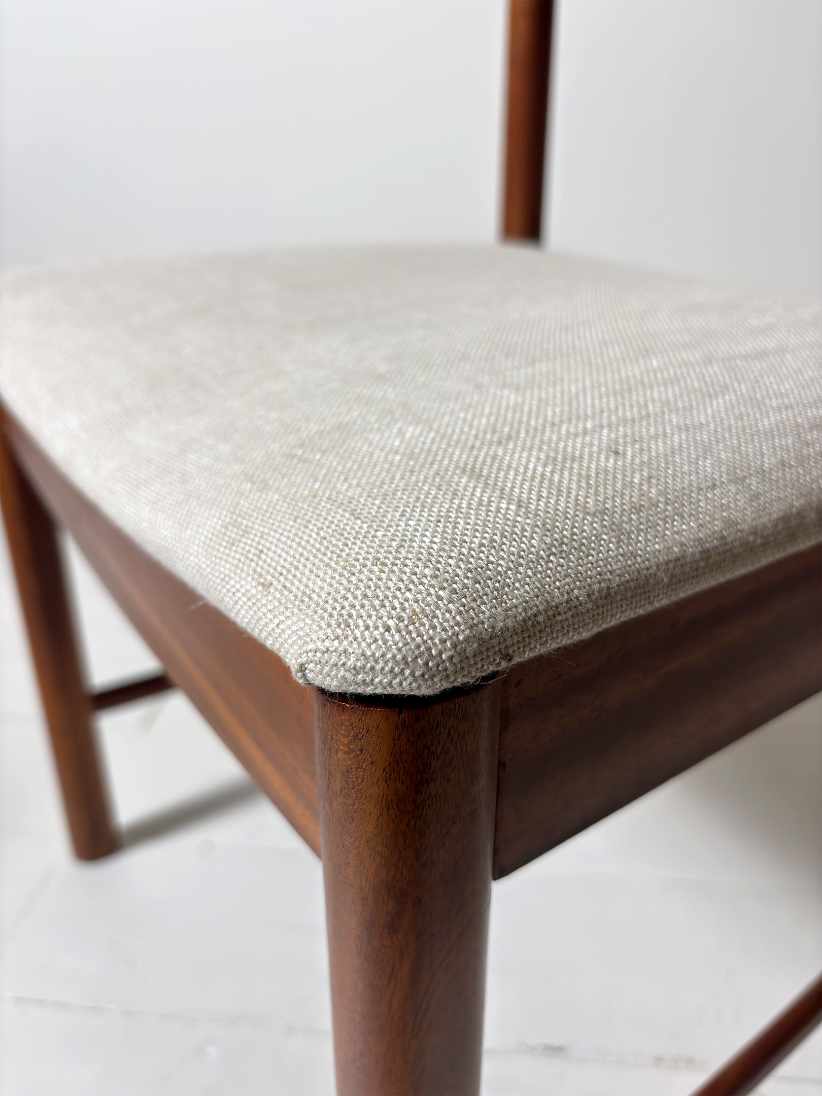 McIntosh dining chair with carved back detail 1960s" or "McIntosh carver chair with arms Tom Robertson design. Teak, Reupholstered, restored.